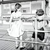 Boy and Girl on a Boardwalk 